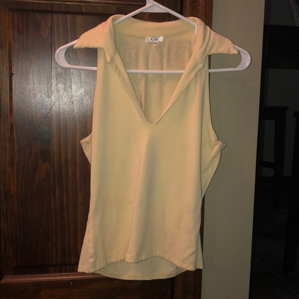 Yellow sleeveless polo